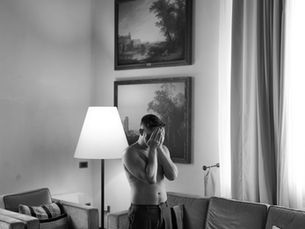 Couple laughing together at Castello Visconteo during their wedding portraits