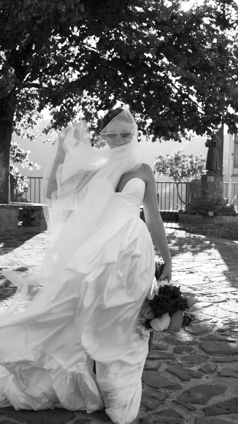 Bride’s veil flowing in sunlight, fine art wedding photography Rocca Cilento.