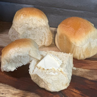 Sourdough Hawaiian Rolls With Butter on Roll
