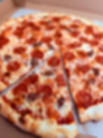 Pepperoni and cooked sausage pizza with marinara sauce and mozzarella.