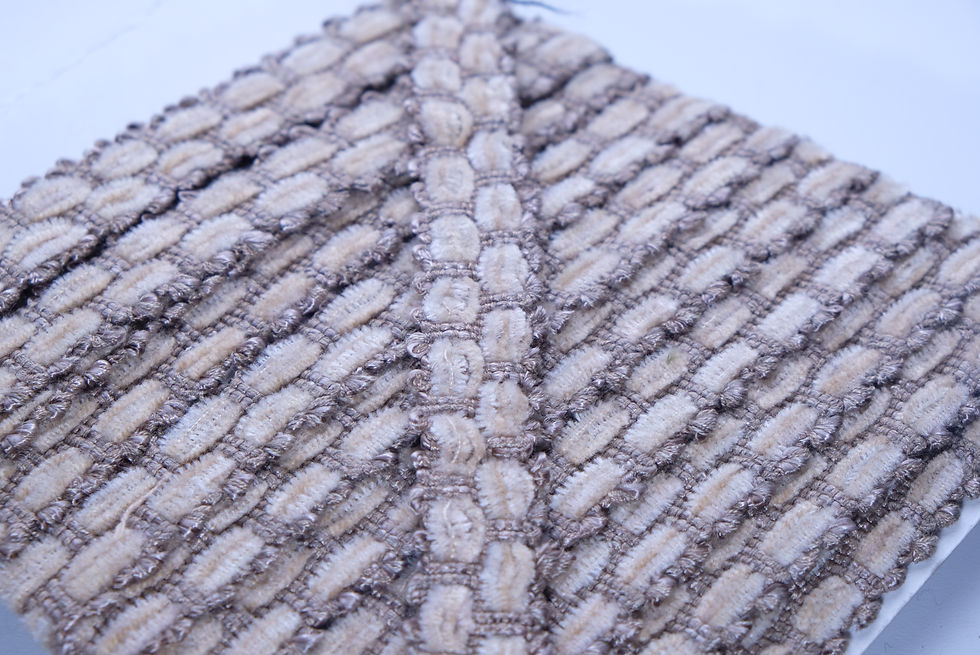 Textured chenille trim in warm beige and taupe with a raised woven design.