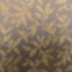 Gold leaf-pattern fabric in warm brown tones