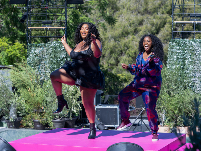 The popstar Lizzo dances with a contestant