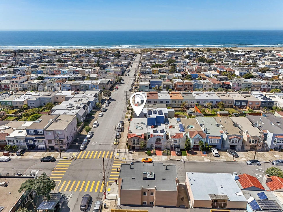 Aerial view of coastal homes for sale near the beach