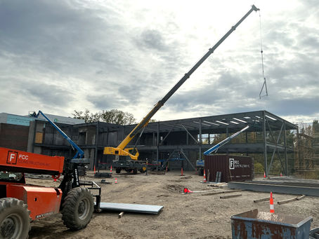 Rising Steel and a Site in Motion