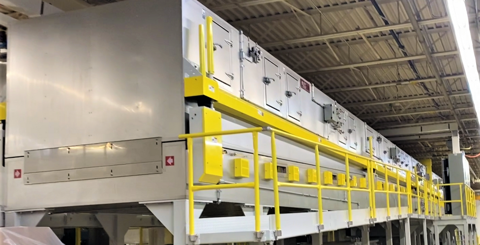 ASI roll-support dryer for adhesives converting line.