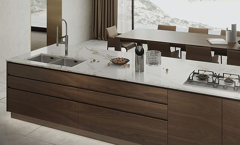 BOLONI Nepal kitchen island with timber fronts, a pale worktop and a dining table beyond
