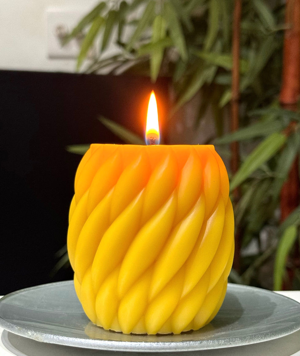 Pure beeswax candles in decorative designs