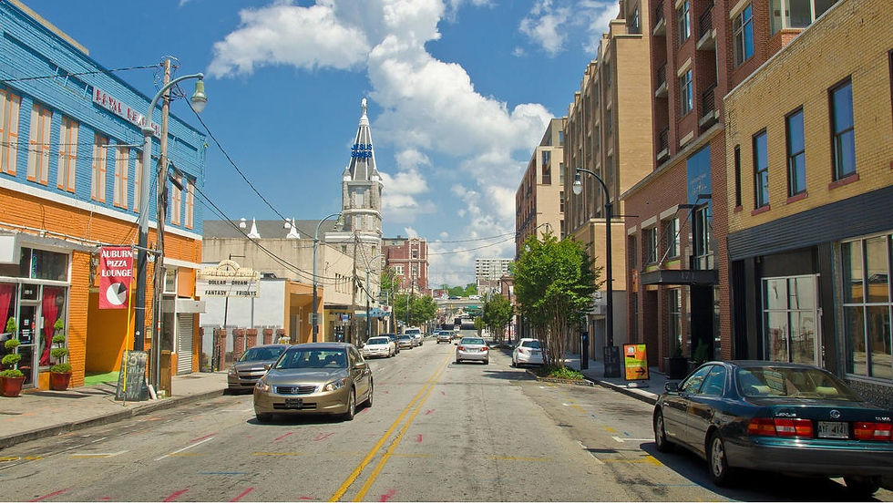 Historic storefronts and the Bailey Theater clock tower along Auburn Avenue in Atlanta's Sweet Auburn Historic District