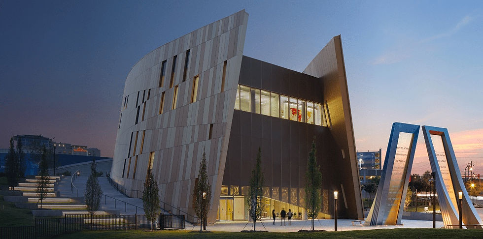National Center for Civil and Human Rights building exterior at dusk near Centennial Olympic Park in downtown Atlanta