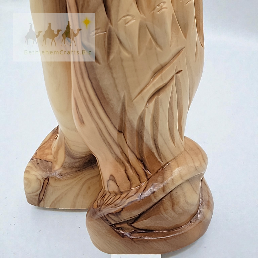 Thumbnail: hand carved sculpture of two praying hands with an olive tree grove in the background for Christian home decor from Holy Land