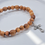 Thumbnail: Simple olive wood bead stretch unisex bracelet with cross charm, minimalist Christian bracelet for men, women from Holy Land