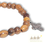 Thumbnail: simple olive wood beaded bracelet with a Christian cross charm for christian gift from the HOly Land