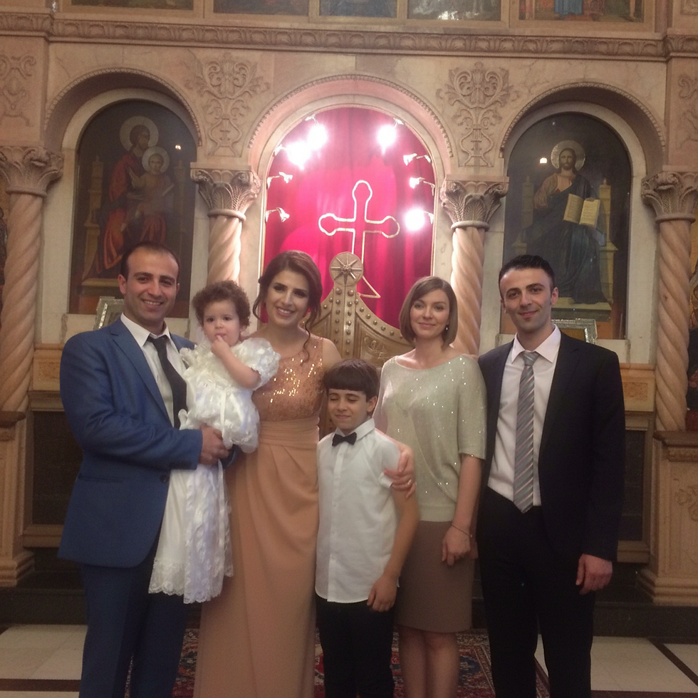 Bethlehem Christians family posing inside a church