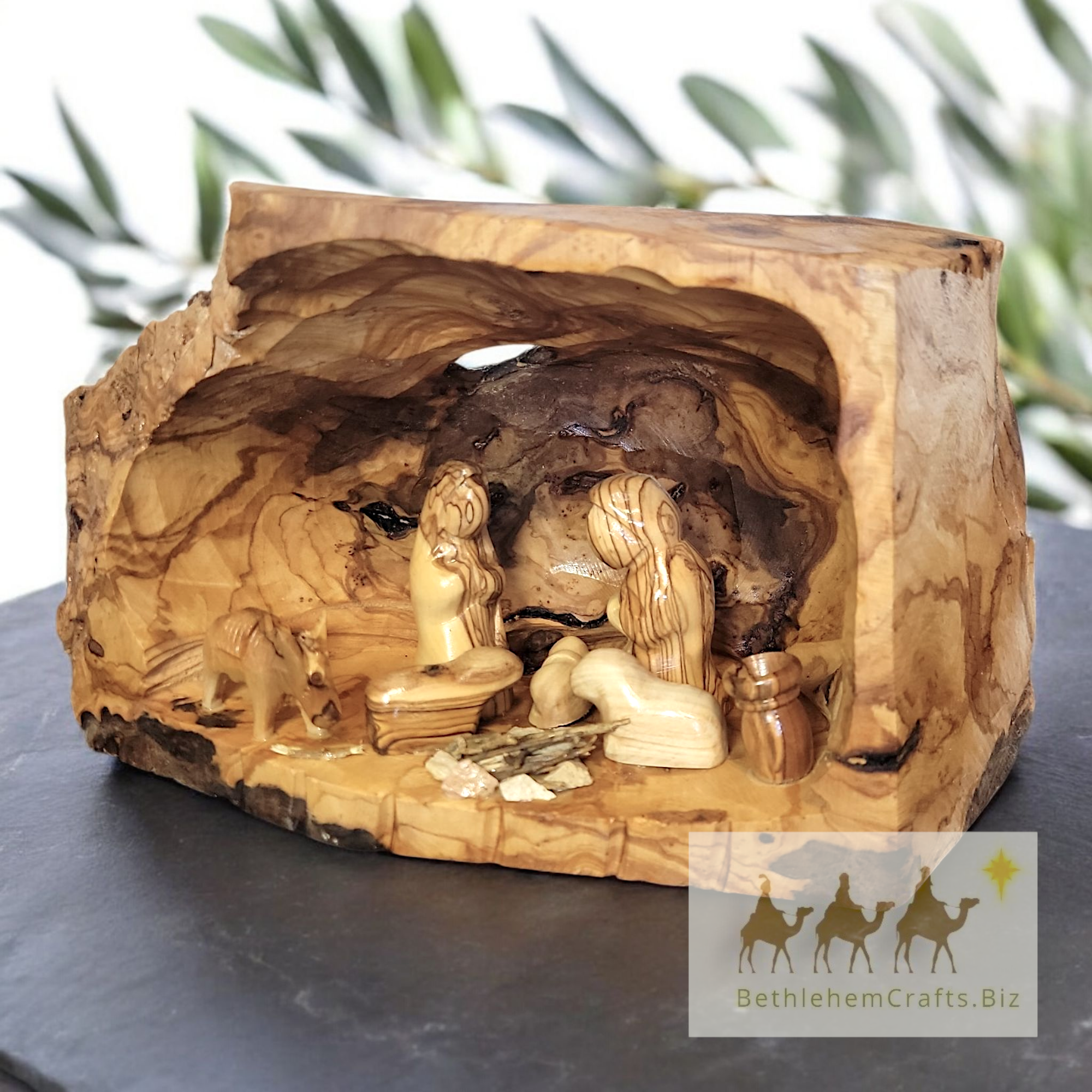Authentic Holy Land olive wood nativity manger scene in rustic log handmade in Bethlehem for Christian Christmas d�cor gift