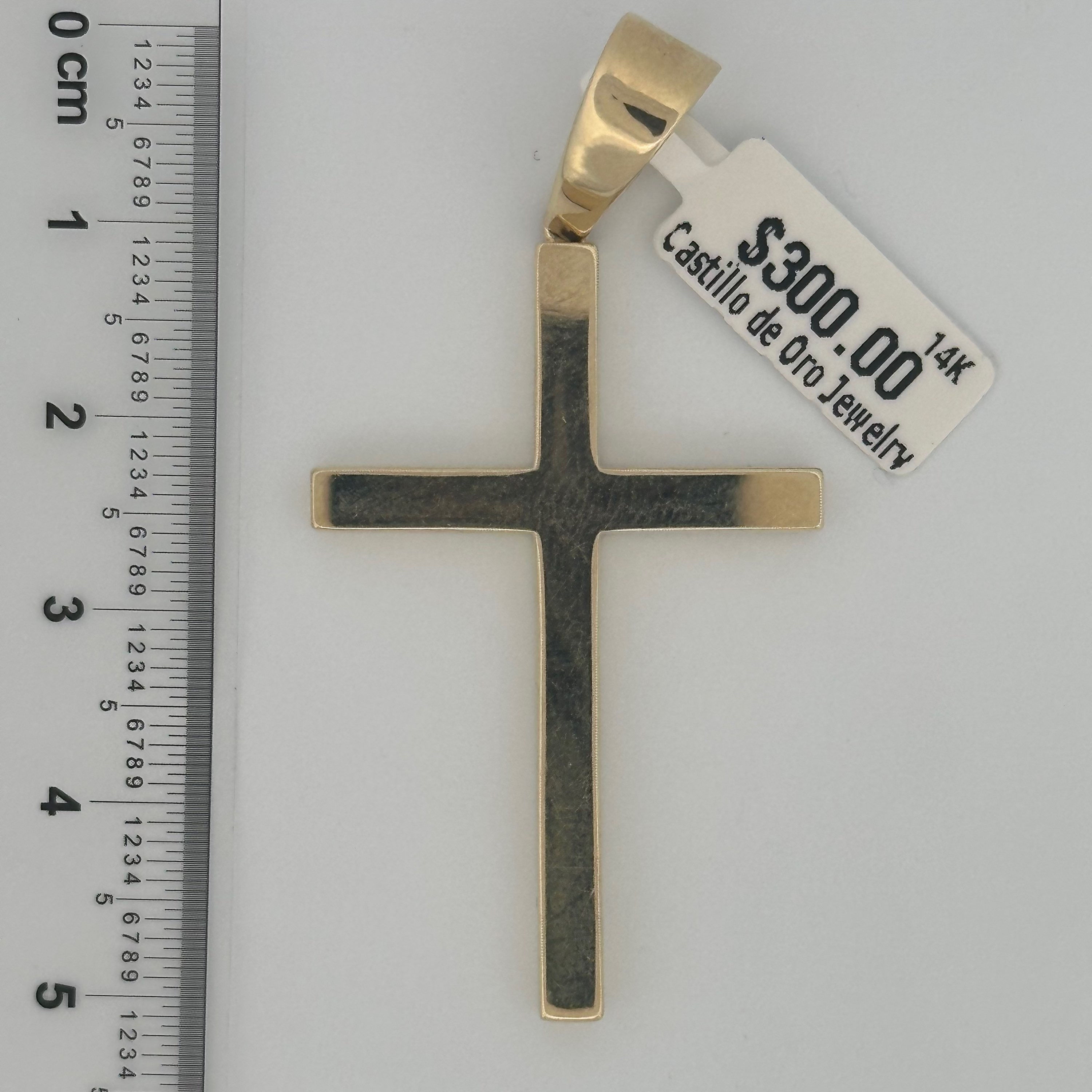 Cross pendant in 14k gold