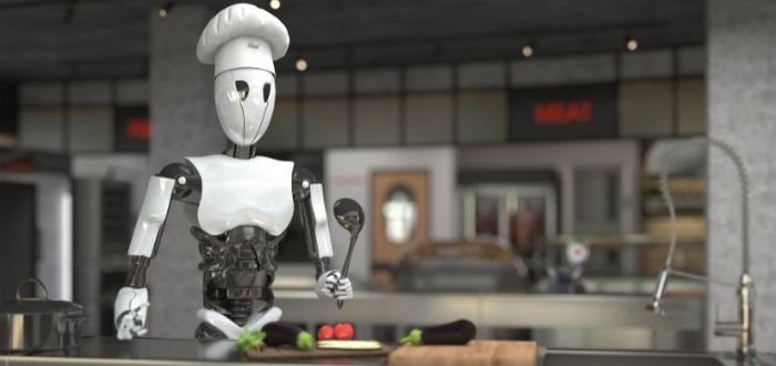 Autómata con apariencia de hombre cocinando