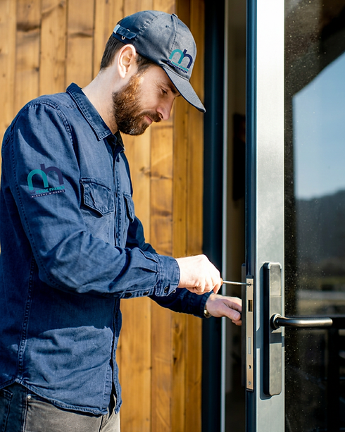 Repair man fixing door.png