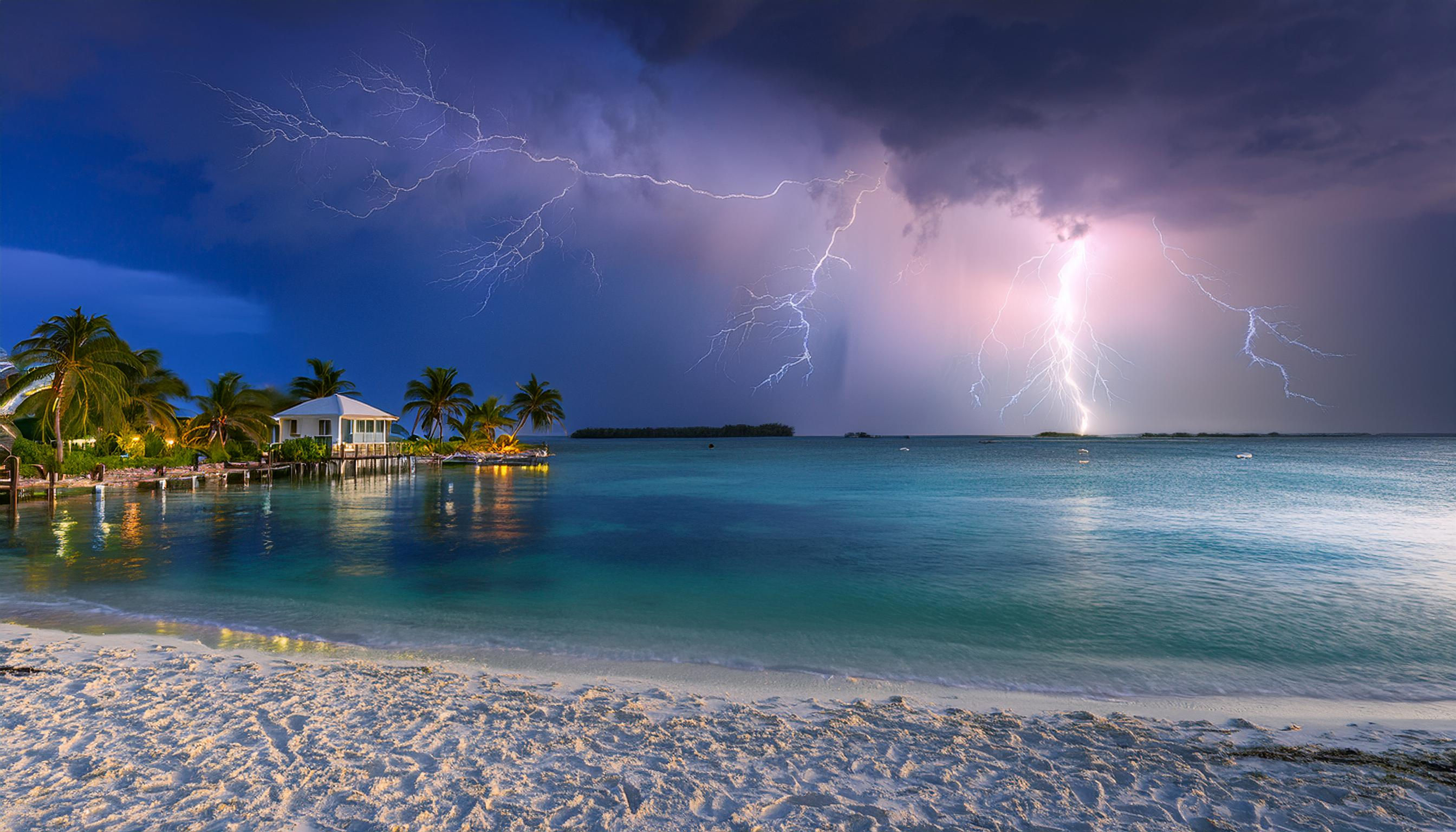 Islamorada, Florida at Dusk with a storm and lightning and sunset light.