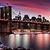 Brooklyn Bridge and New York City Skyline at Sunset.