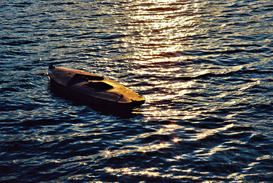 A Solitary Kayak at Sunset
