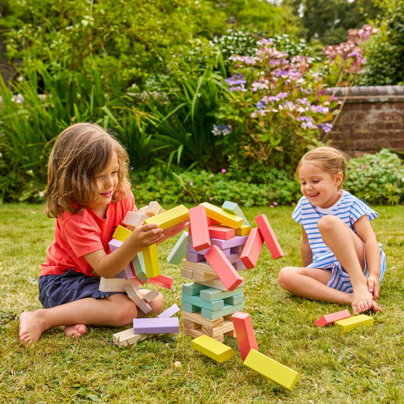 Children playing with blocks outside