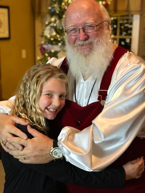 Santa gives the best hugs