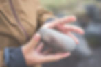 Holding a stone