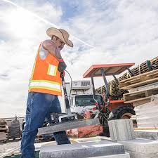 grabo high flow with t handle kit man lifting up paver