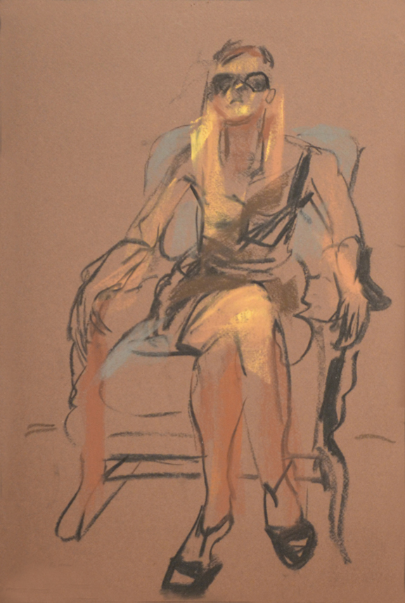 Sitting with sunglasses on