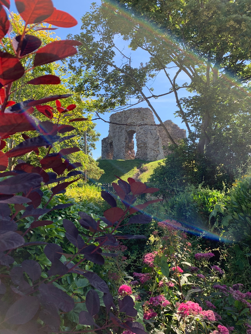 Looking up to Christchurch Castle Ruins on a sunny day.