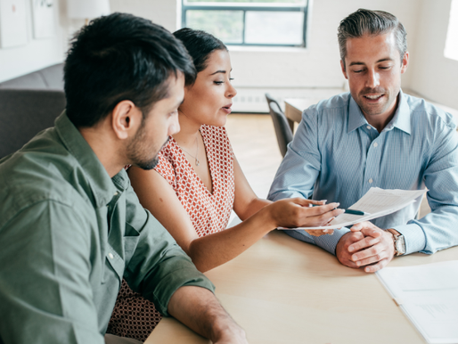 Couple at table reviewing PMI