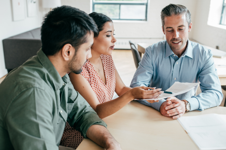 Couple at table reviewing PMI