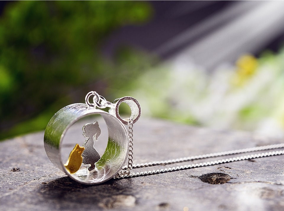 Thumbnail: Silver Girl and Cat Necklace Stone Background