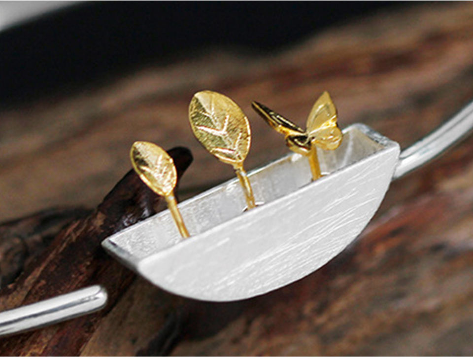 Thumbnail: Closeup little silver pot gold plated plants bangle