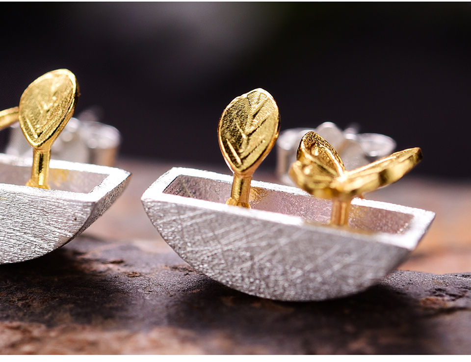 Thumbnail: Closeup garden stud earrings