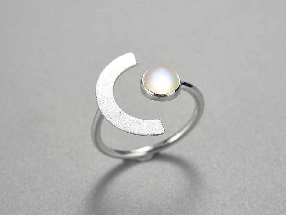Thumbnail: Silver Eclipse Ring Grey Background Top View