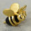 Thumbnail: Gold And Black Queen Bee Earrings Single Closeup