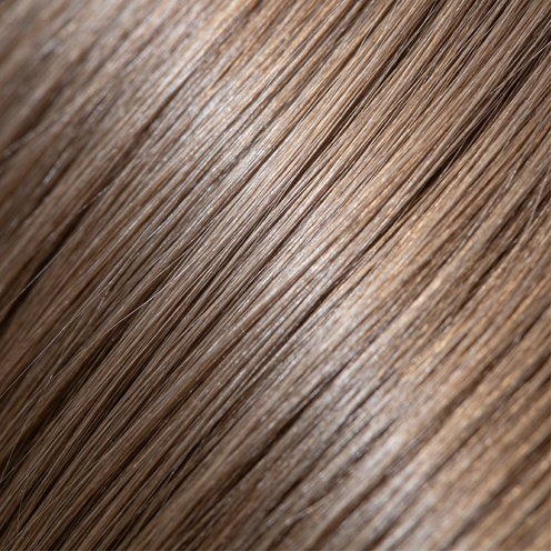 Close-up of smooth, shiny light brown hair strands