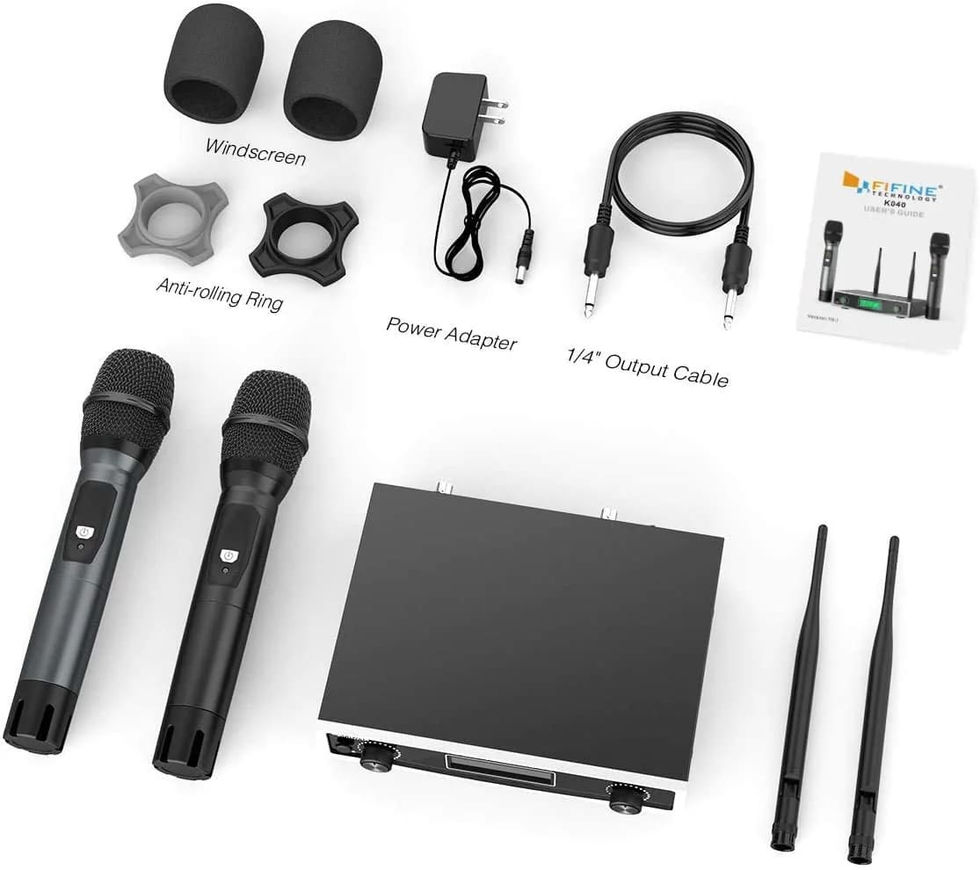 a wireless microphone with it's receiver packaging details, what's in the box