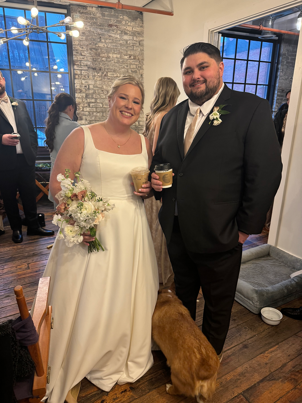 Wedding couple posing with Carter Coffee Company coffee drink