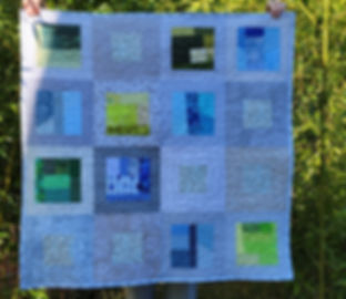 Grey and blue and green baby quilt