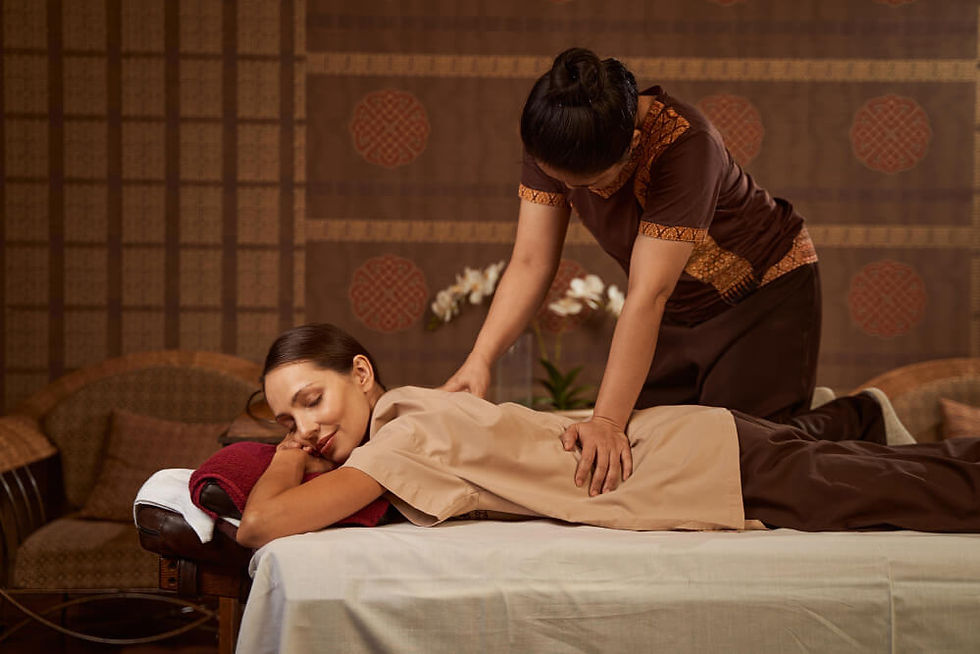 experienced-massotherapist-giving-female-patient-thai-massage.jpg