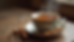 Close-up view of a traditional cup of chai tea with spices on a wooden table