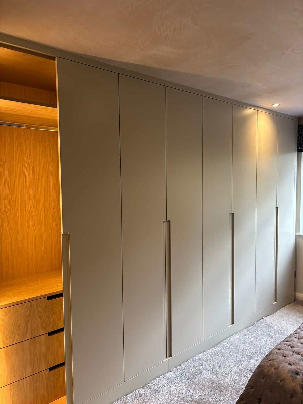 Wardrobe interior with integrated lighting and drawer storage