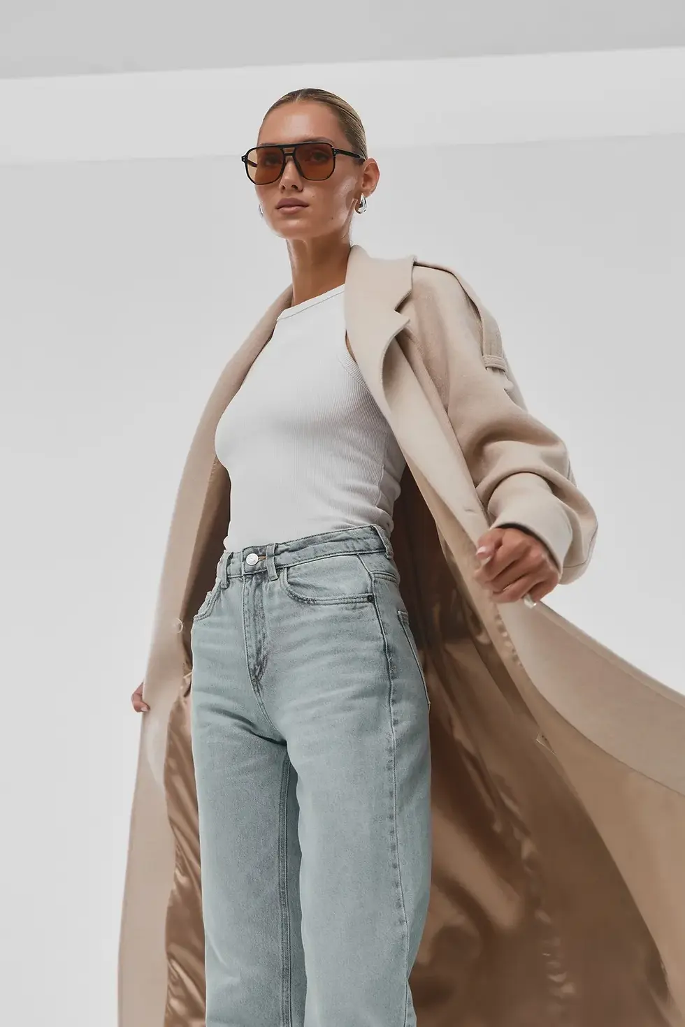 Thumbnail: Detailed look at the buttons on the Odesa Cream Wool Coat