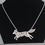 Thumbnail: Handmade Sterling Silver Running Fox Necklace — Floral Cut-Out Design