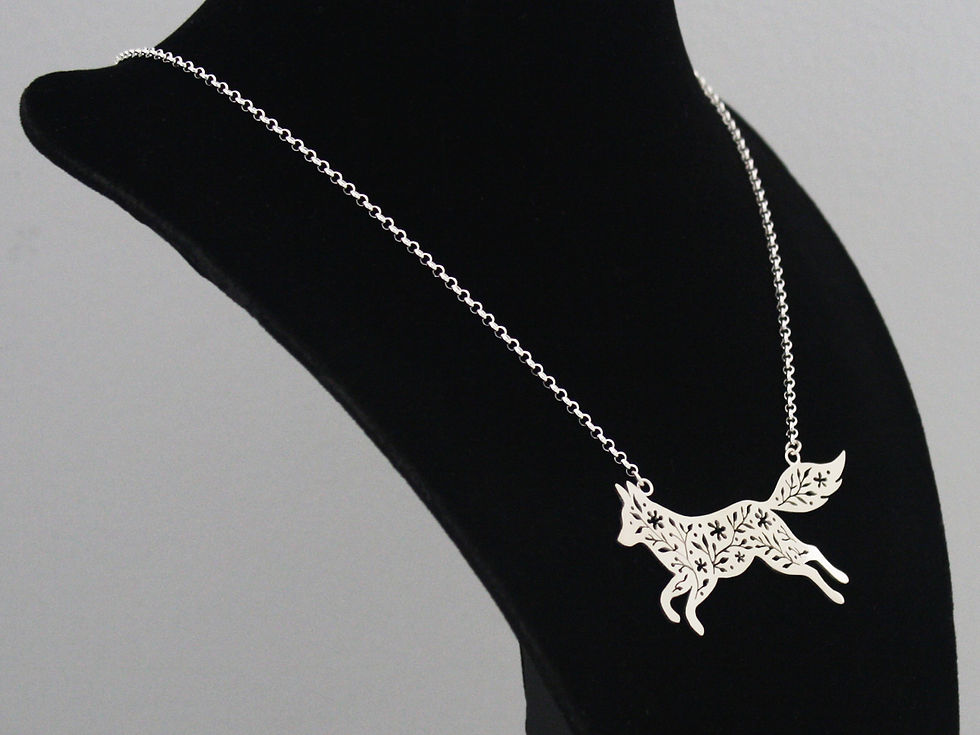 Thumbnail: Handmade Sterling Silver Running Fox Necklace — Floral Cut-Out Design