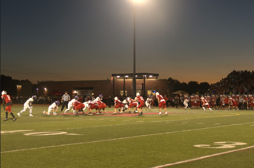 Quarterback Matt Kosiorek lining up in the shotgun waiting to call the snap. Sept 19. 2025. Photo Credits (Cole Liebler/89.1 the Point)