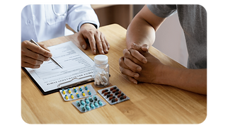 doctor-and-patient-providing-advice-on-medication.png
